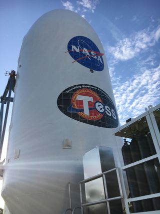 TESS inside its payload fairing.